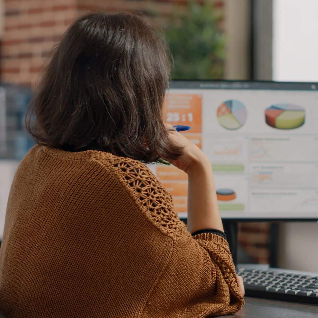 Woman reviewing data from website tracking codes